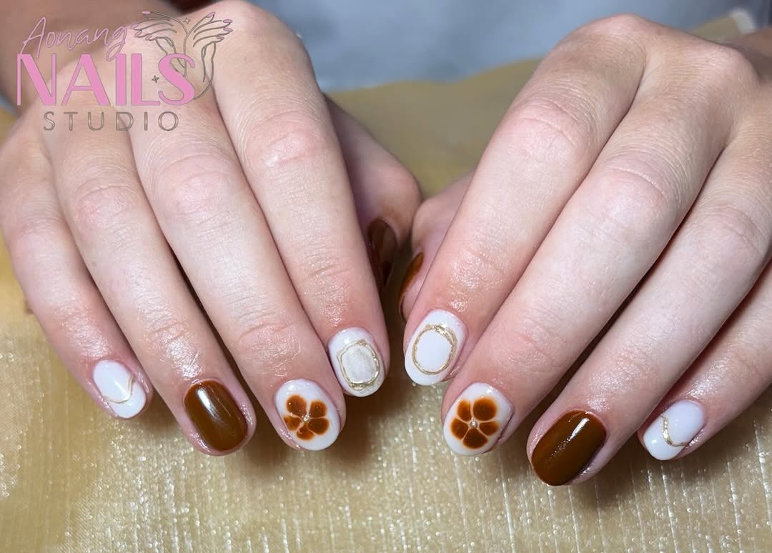 BIAB gel colour with hand-painted flowers at Ao Nang Nail Studio